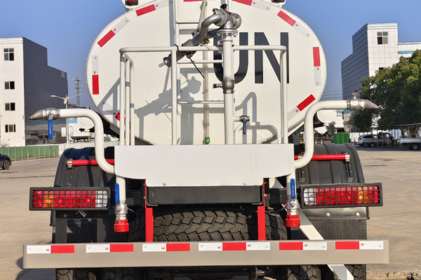 Rear water spraying nozzles and platform